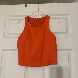 Mid drift tank top with built in sports bra